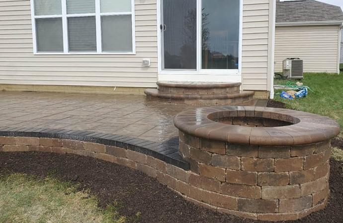 Paver fire pit installation and patio