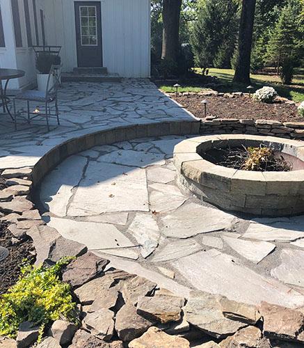 Fire pit and natural stone patio installer Natural stone patio and fire pit installation