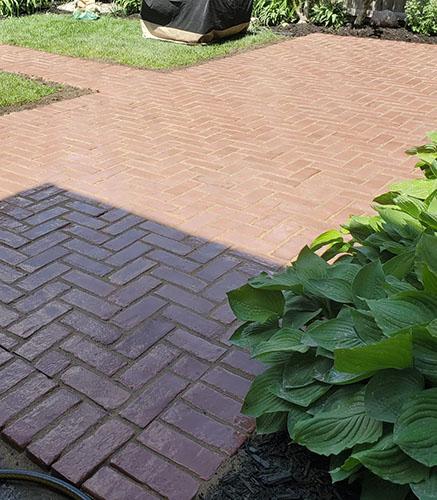 Brick paver patio in backyard