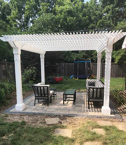 White gazebo in backyard