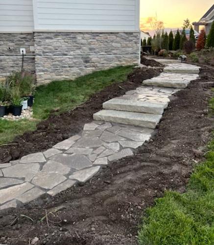 Flagstone walkway and natural stone steps